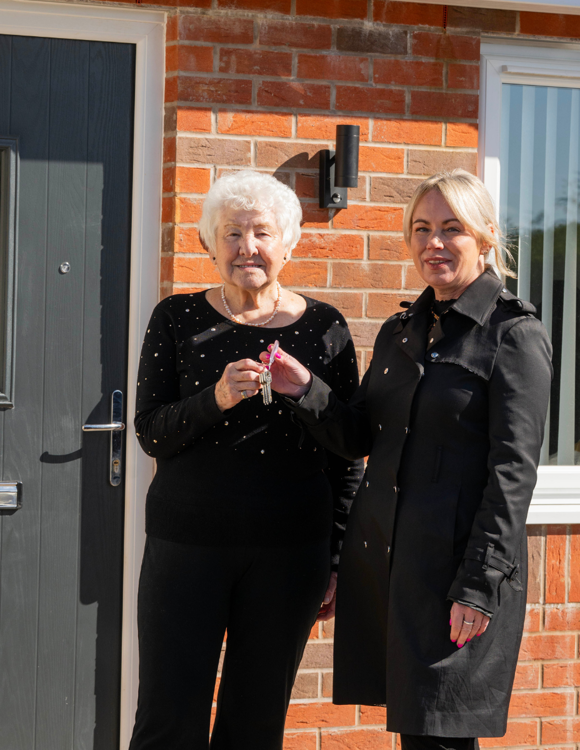 First residents move into bungalows built on former garage site
